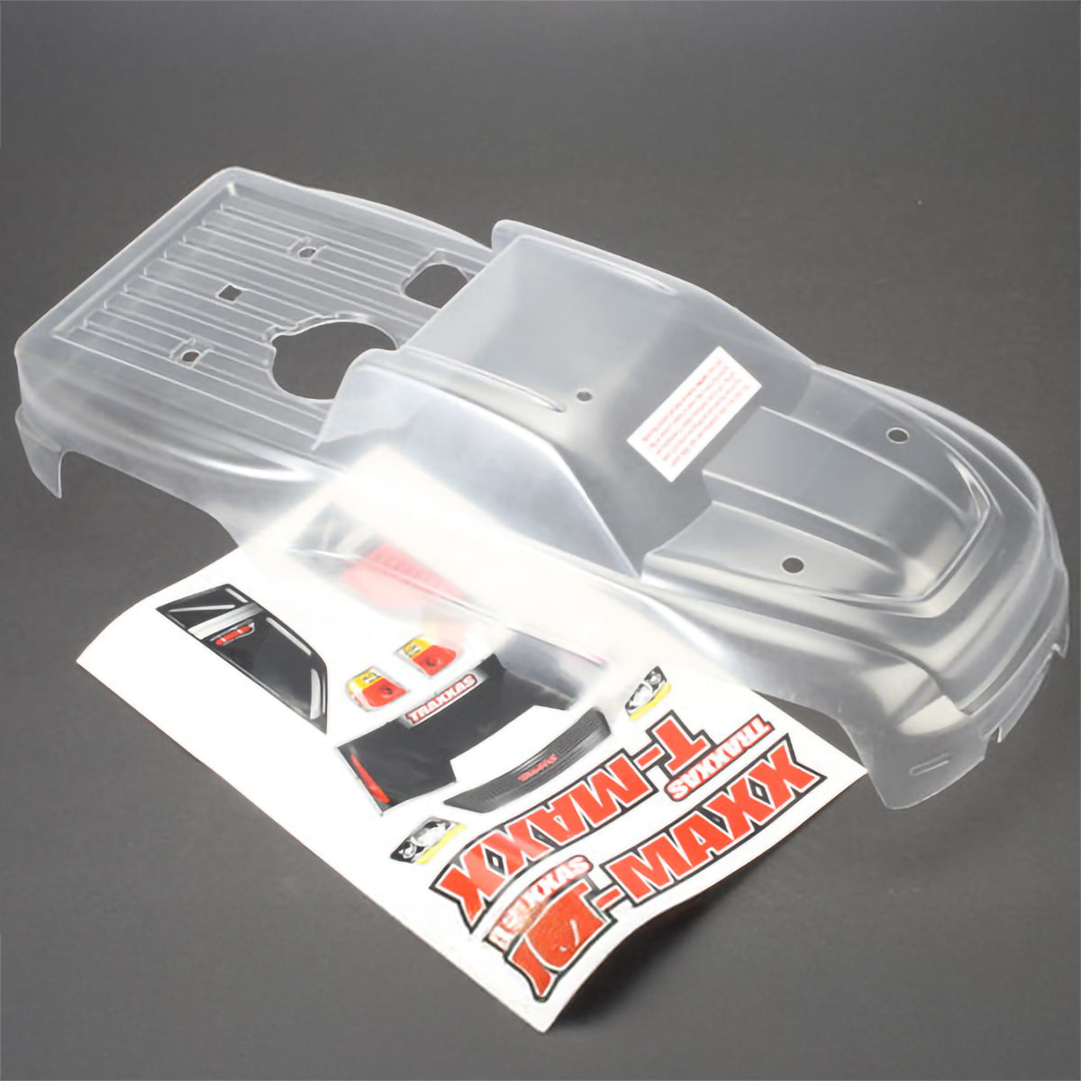 Traxxas T-Maxx® Body, (long wheelbase) (clear, requires painting)/ window, lights decal sheet