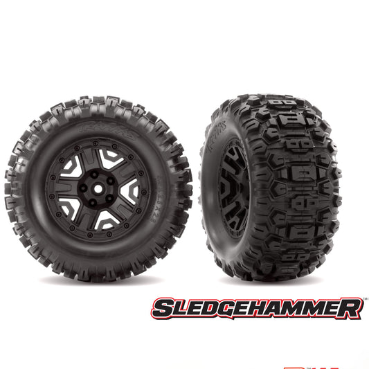 Traxxas Tires & Wheels, Assembled, Glued (black 2.8' wheels, Sledgehammer™ tires, foam inserts) (2) (TSM® rated)